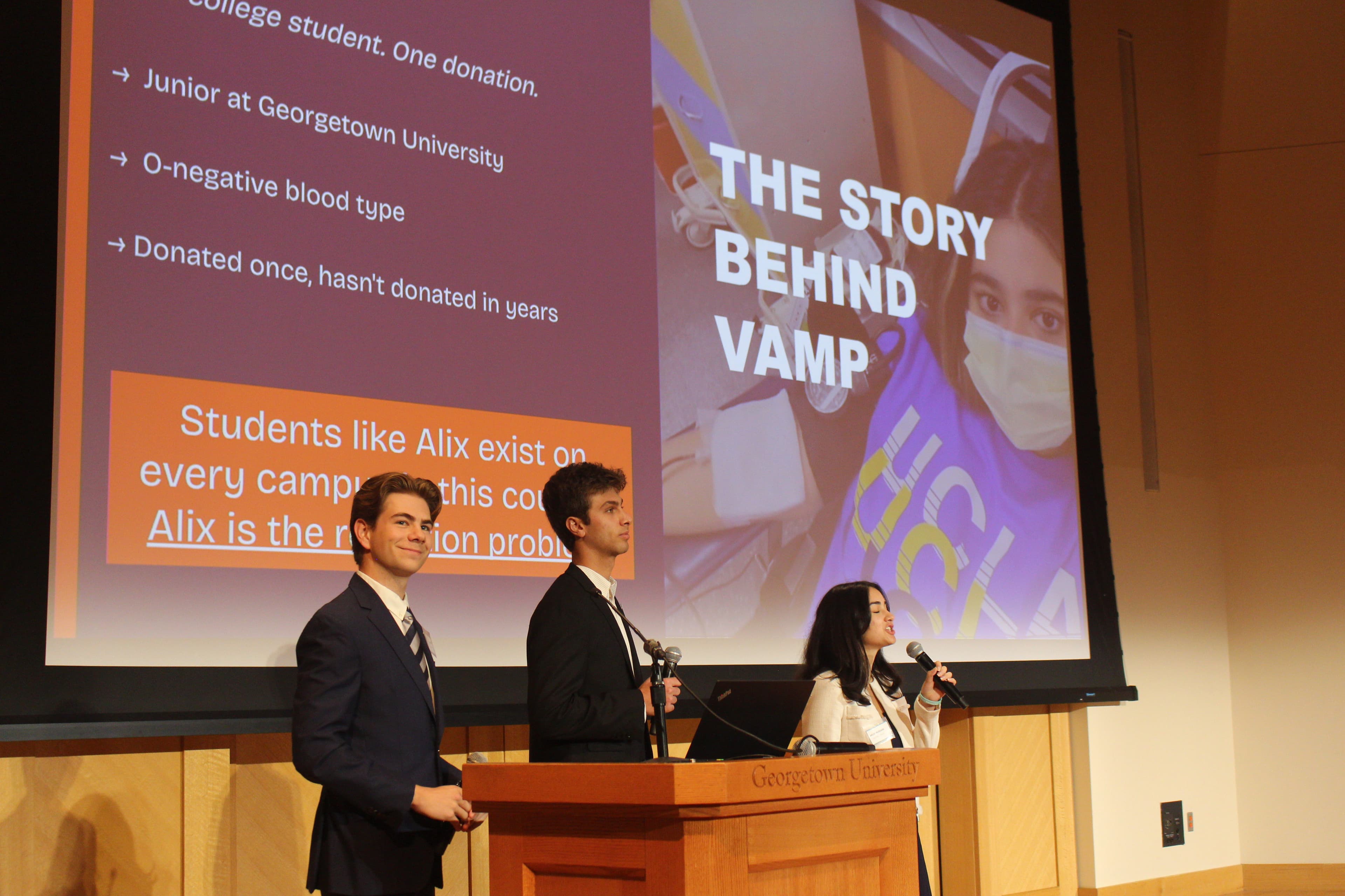 Founders pitching their startup on stage at Georgetown Ventures Demo Day